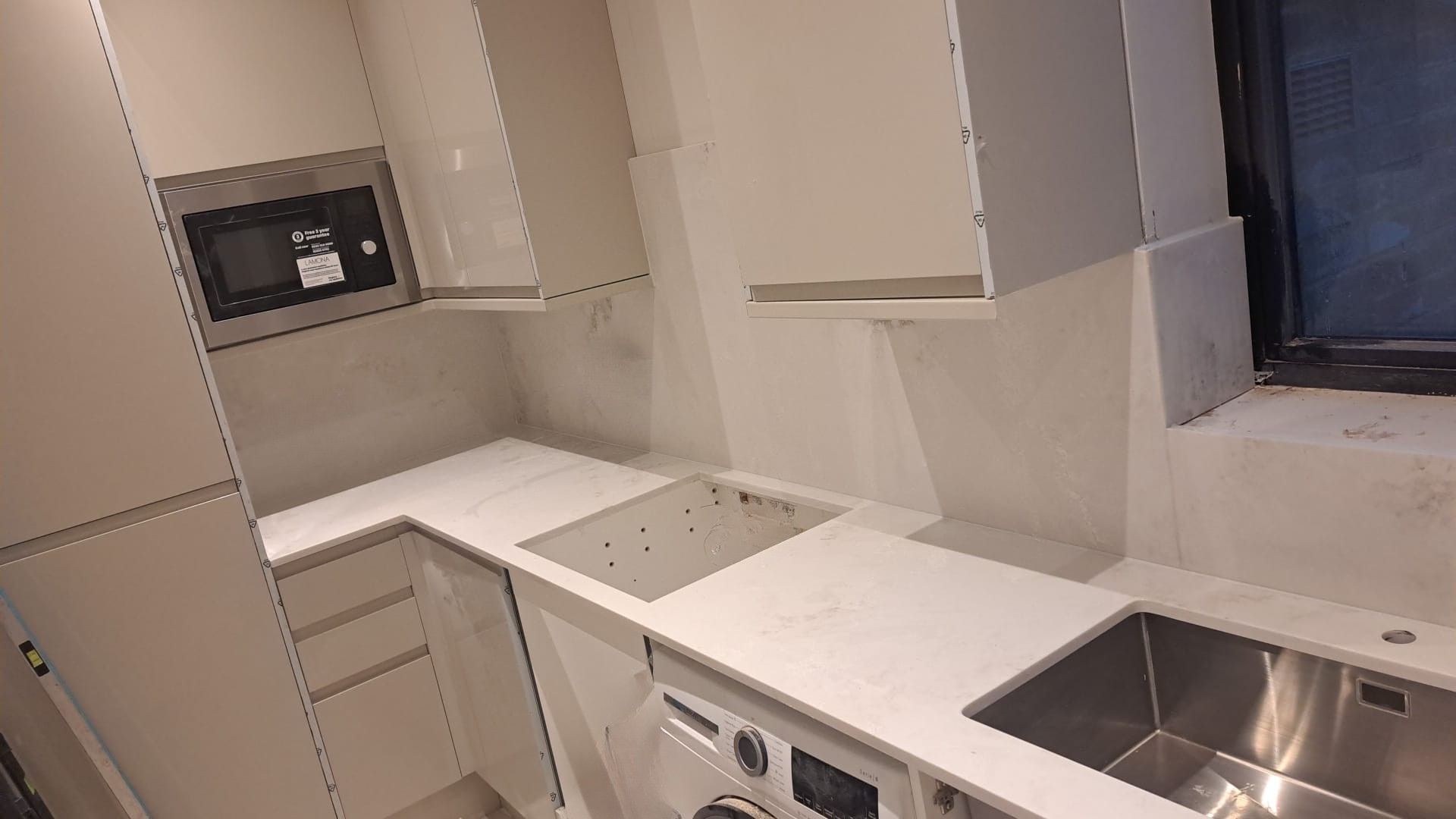 Ocean white leather kitchen worktop project in London